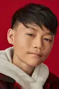 Porträtt av Izaac Wang