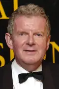 Porträtt av John Motson