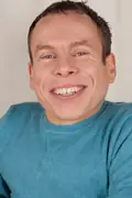 Porträtt av Warwick Davis