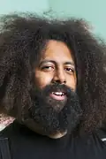 Porträtt av Reggie Watts
