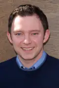 Porträtt av Nate Corddry