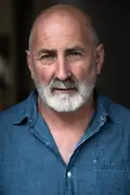 Porträtt av Greg Johnson