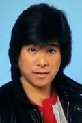 Porträtt av Brian Tochi