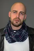 Porträtt av Alex Anlos