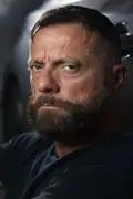 Porträtt av Tom Sons