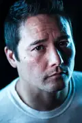 Porträtt av Johnny Yong Bosch