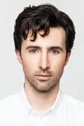 Porträtt av Josh Zuckerman