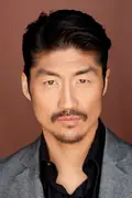 Porträtt av Brian Tee