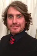 Porträtt av Jason Michas
