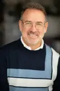 Porträtt av Ian James Corlett