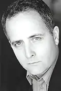 Porträtt av Colin Murdock