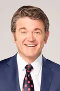 Porträtt av John Michael Higgins