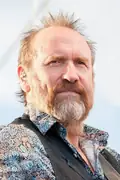 Porträtt av Colin Hay