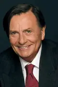 Porträtt av Barry Humphries