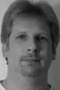 Porträtt av Jason Fricchione