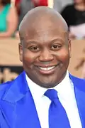 Porträtt av Tituss Burgess