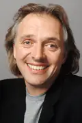 Porträtt av Rik Mayall